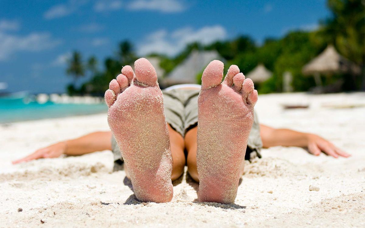 Maldives beach vacation feet sand