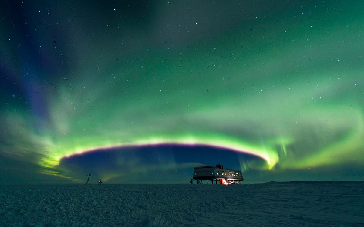 The Aurora Australis displaying over German Antarctic Research Base Neumayer III. It takes an almost perfectly round shape, a sight which is very rare.