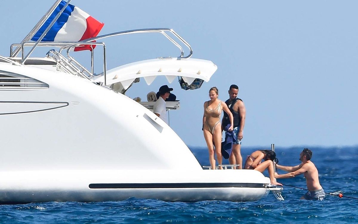 Model Chrissy Teigen and her hubby John Legend were seen enjoying a day in the sun on a yacht in Corsica, France