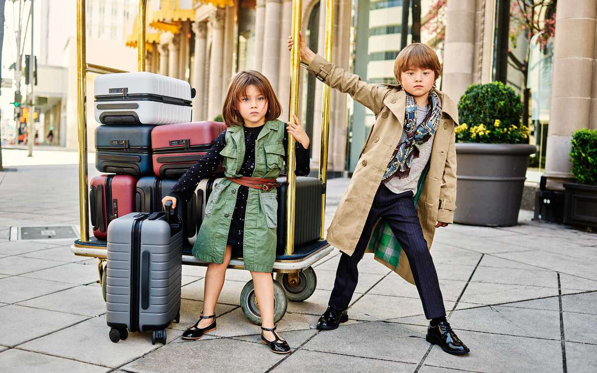 Kids with a Luggage Cart