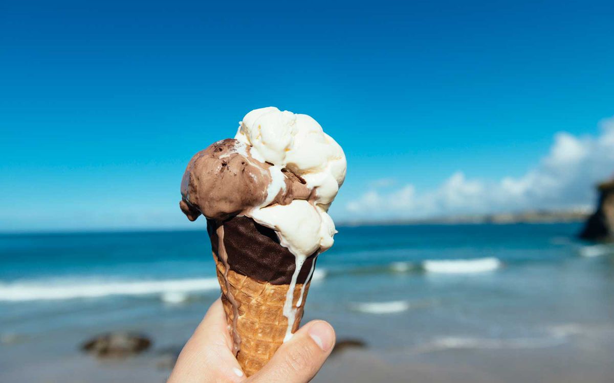 Eating ice cream at the beach in summer