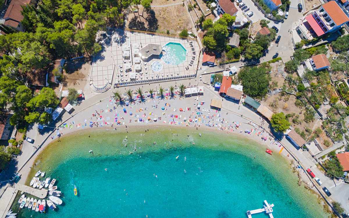 Aerial view of housing estate and beach at Necujam bay at Solta, Croatia