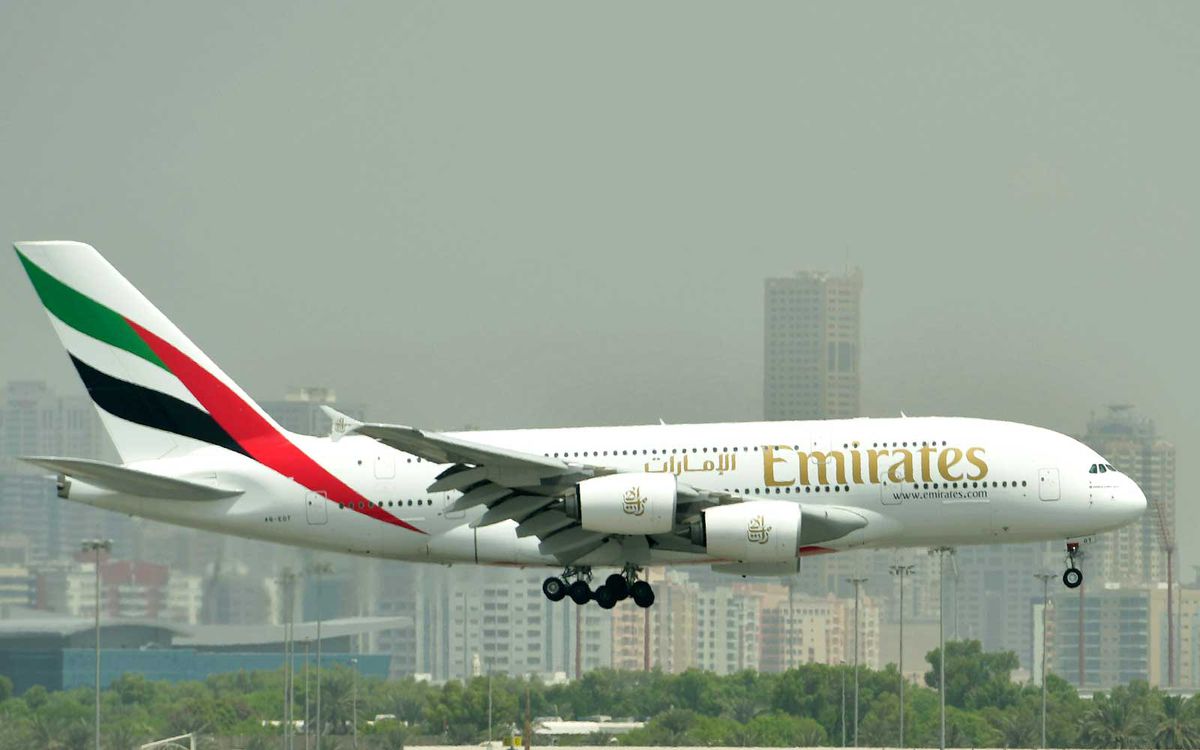 Airbus A380 of Emirates landing at the tarmac at Dubai's International Airport