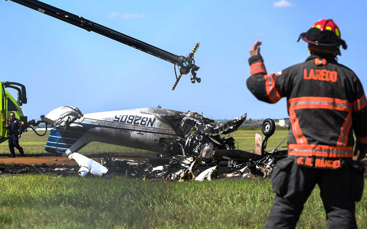 The remains of a small plane are seen after it was crashed at the Laredo International Airport in Laredo, Texas