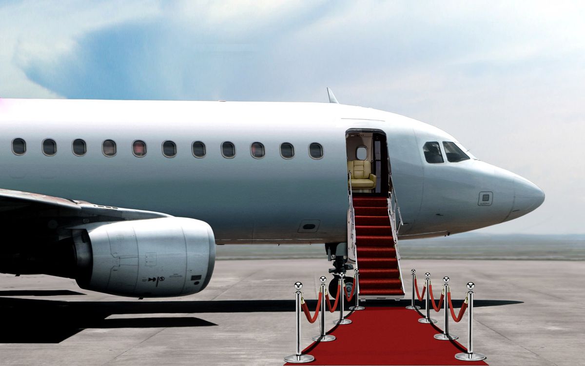 Airplane departure entrance with red carpet