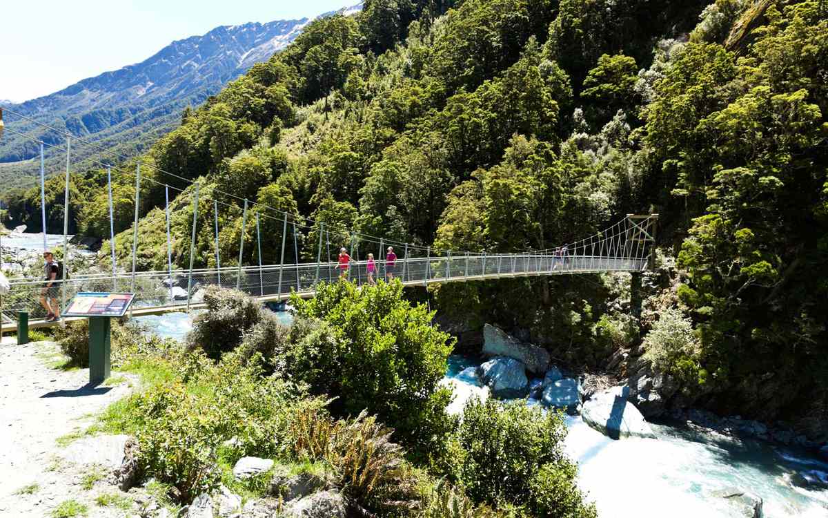A swinging bridge on the path to Rob Roy Glacier, above Lake Wanaka.