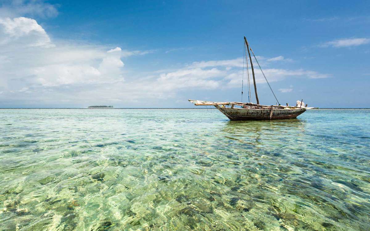 Dhow on the clear waters in Zanzibar