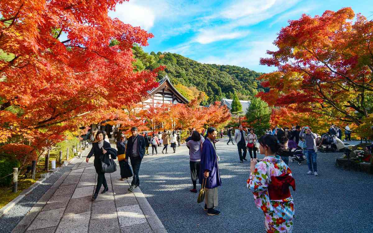 Tourists enjoy fall at Eikan-do Zenrin-ji Temple in Kyoto, Japan