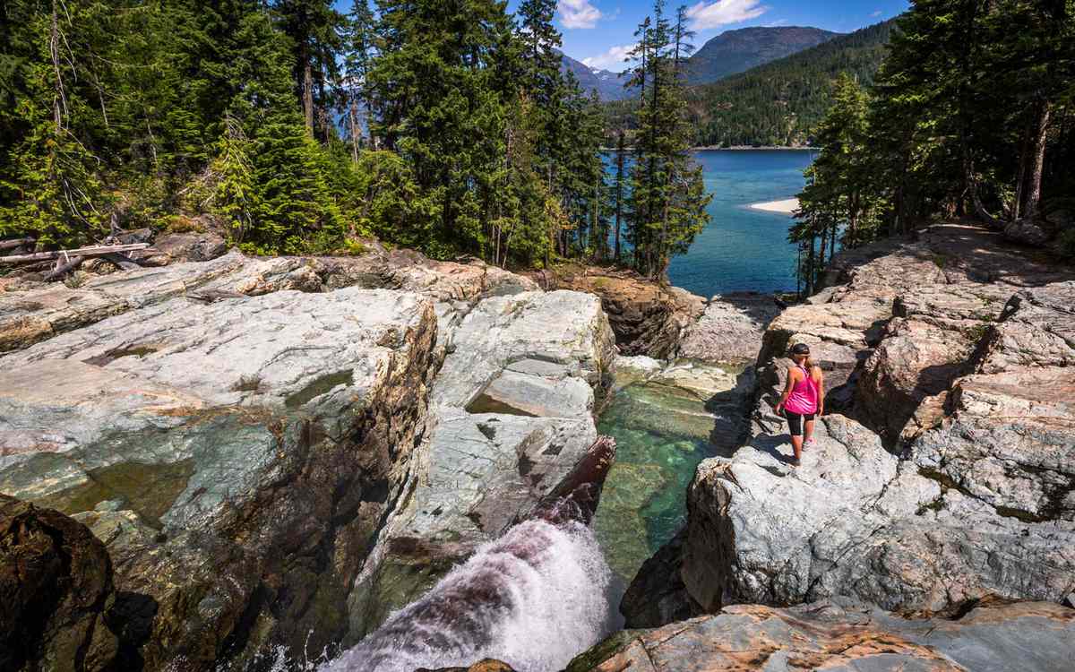 Young woman exploring Strathcona provincial park on Vancouver Island