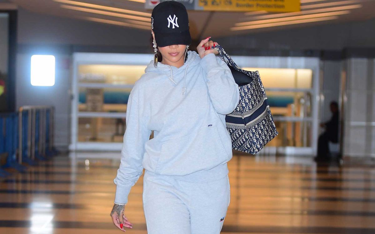 Rihanna Pairs Manolo Blahnik Heels With A Grey Sweatsuit As She Jets Into NYC For Her Pop Up Shop Opening