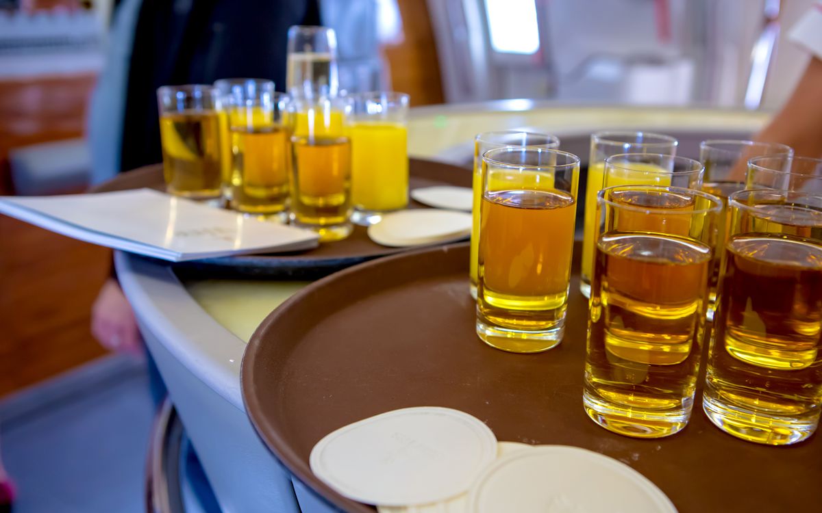 Fresh fruit juice are served to passengers before departure.