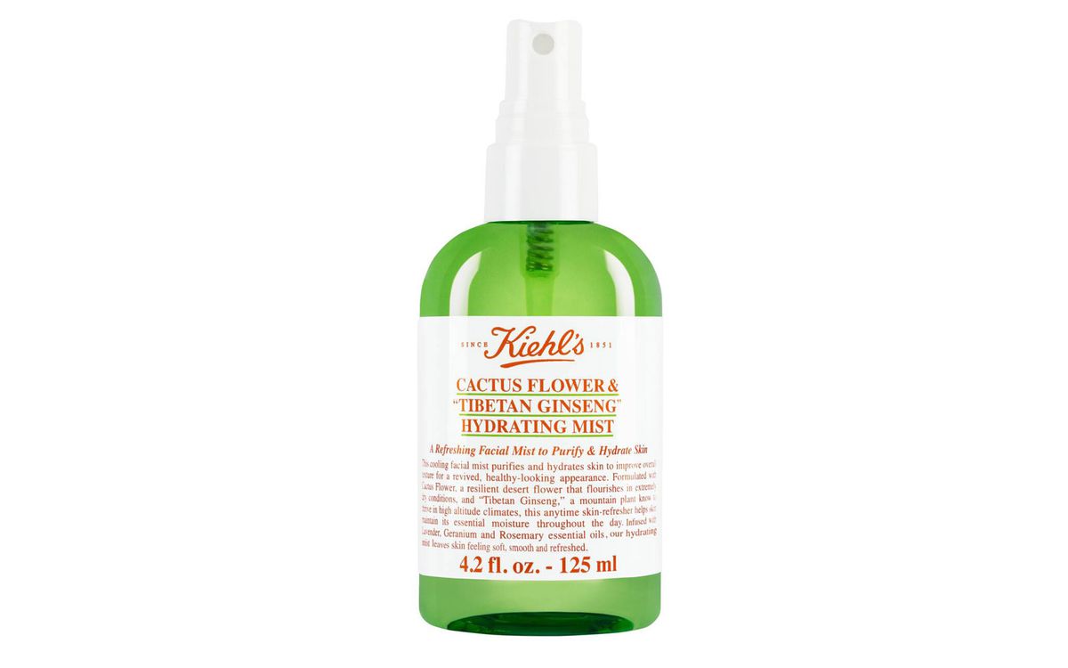 Green and White Bottle of Facial Mist