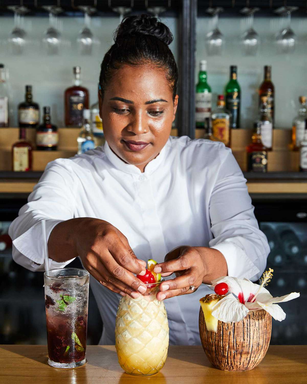 A bartender making cocktails