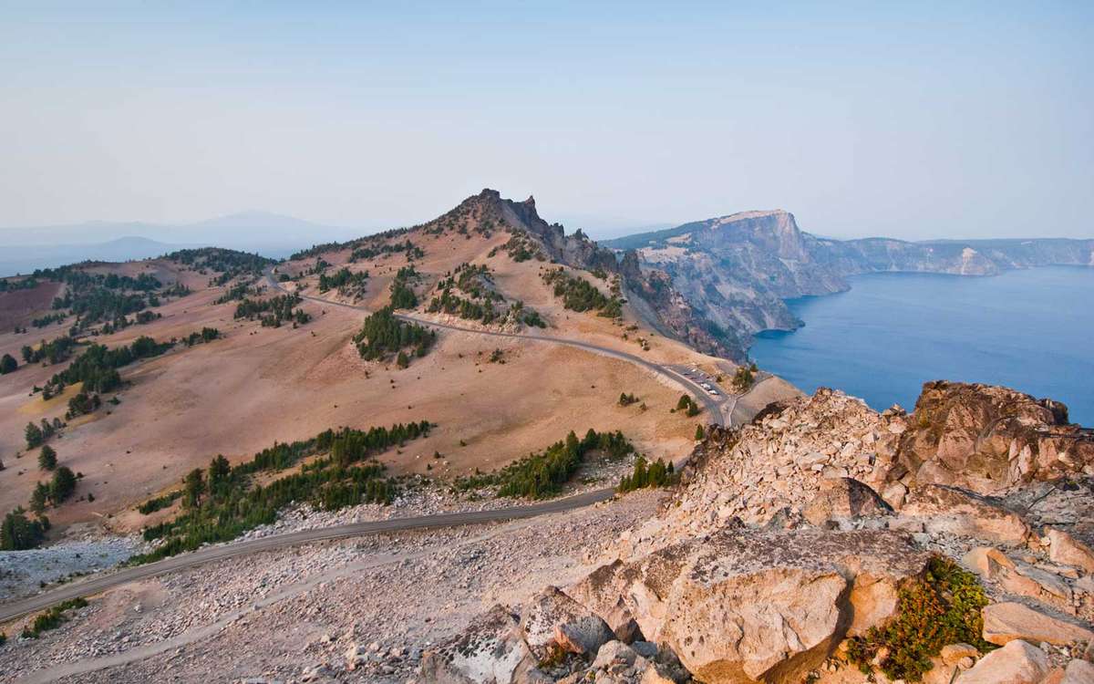 Crater Lake exists in the blown-out caldera of a once mighty volcano known as Mount Mazama. This view of the lake and Hillman Peak was taken from the the Watchman in Crater Lake National Park, Oregon