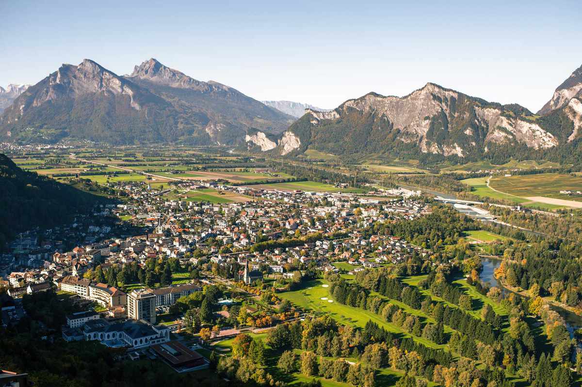 Panorama of the city of Bad Ragaz against the background of the Swiss Alps at sunset