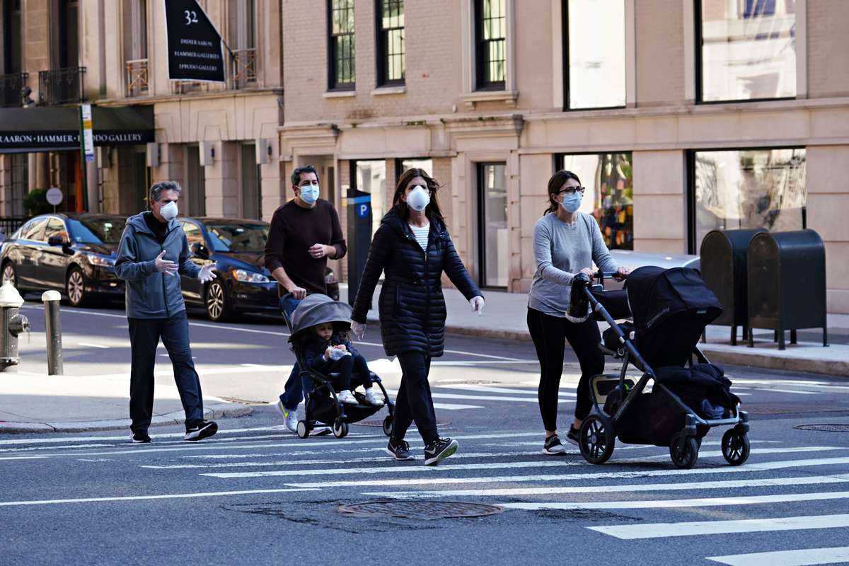 New York residents wearing face masks while walking