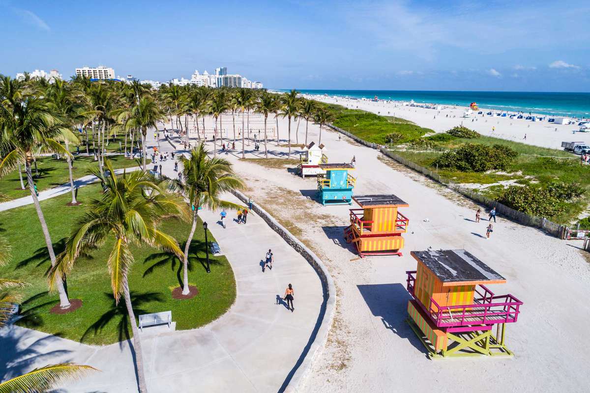 Miami Beach, Aerial of Art Deco District, Lummus Park, lifeguard stations and shore
