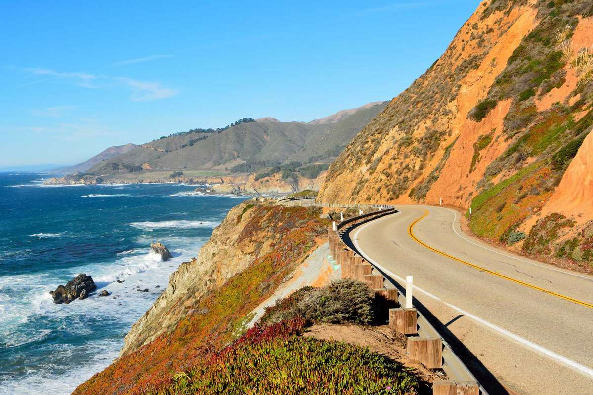 Highway 1 running along Pacific coast in Big Sur state parks in California.
