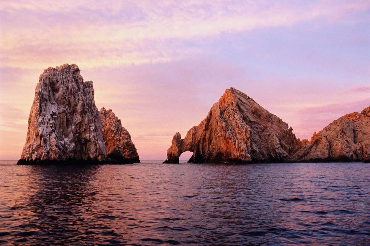 The Arch rock formation in sea at dawn in Cabo San Lucas, Mexico
