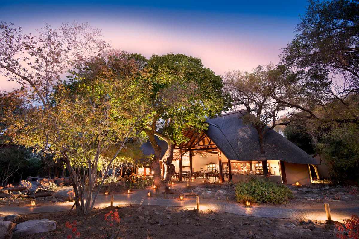Tent lit up at night at the andBeyond Ngala Safari Lodge in South Africa