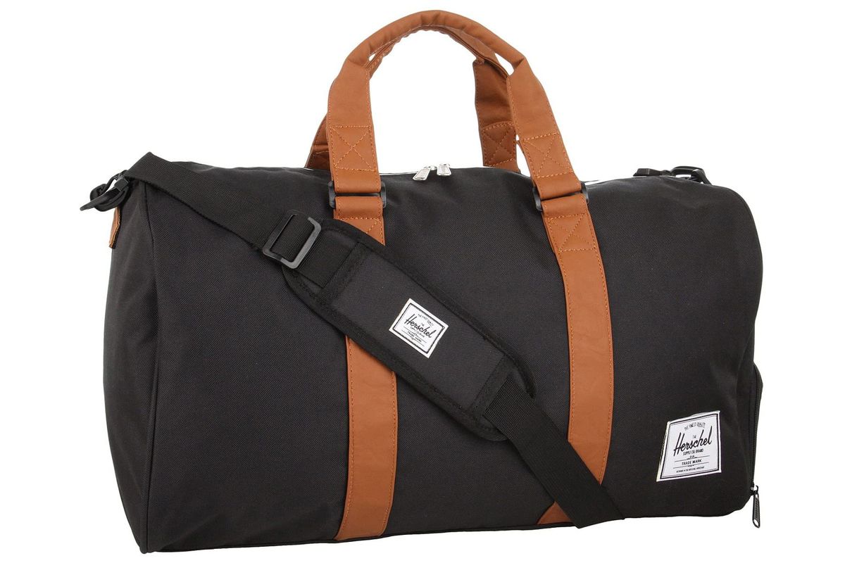 Black and brown duffel bag