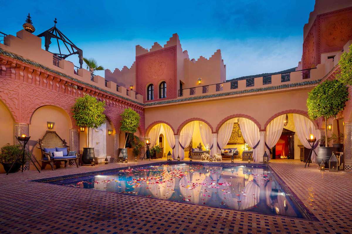 Rose-petal-filled reflecting pool at the Kasbah Tamadot resort in Morocco