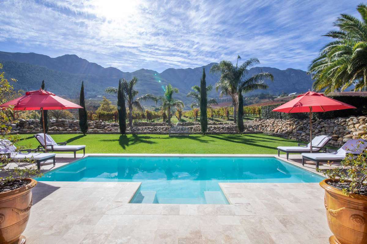 Pool with mountain views at the La Residence resort in South Africa