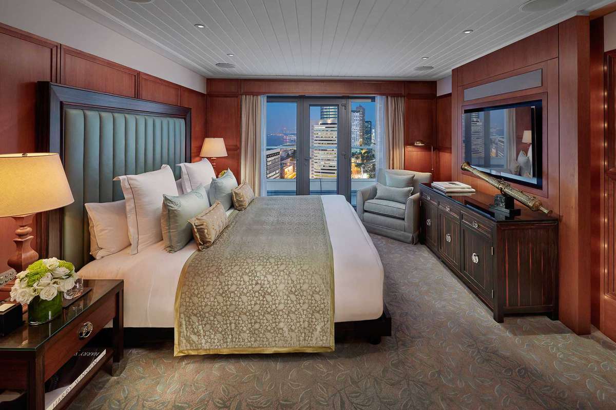 Guest room with city views at the Mandarin Oriental, Hong Kong hotel