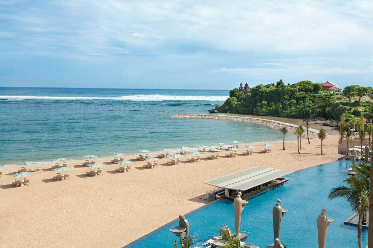 Pool and beach at The Mulia, Bali resort