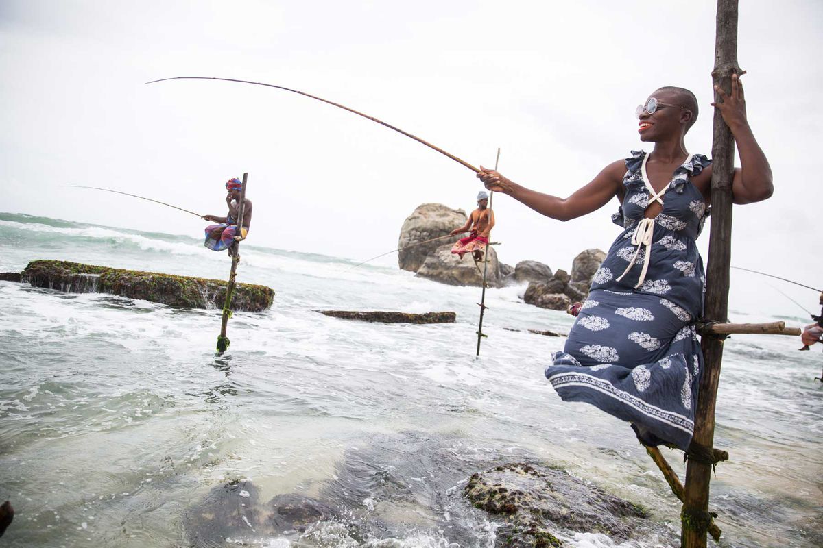 Jessica Nabongo fishing from a pole in Sri Lanka