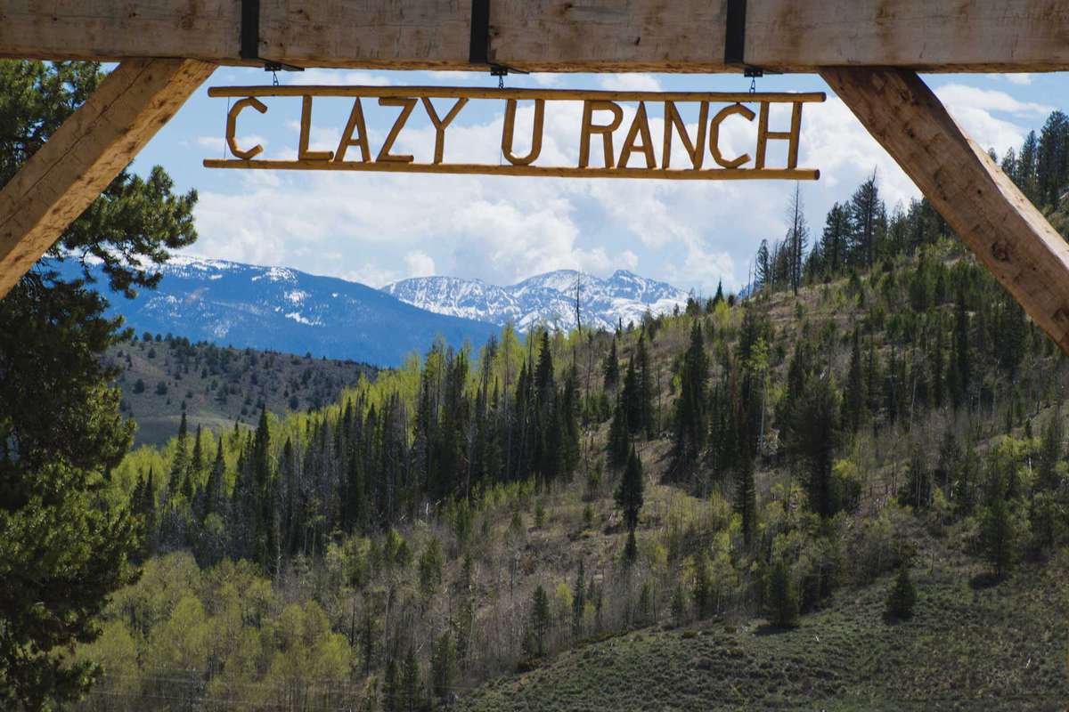 Gate with sign at the entrance of C Lazy U Ranch
