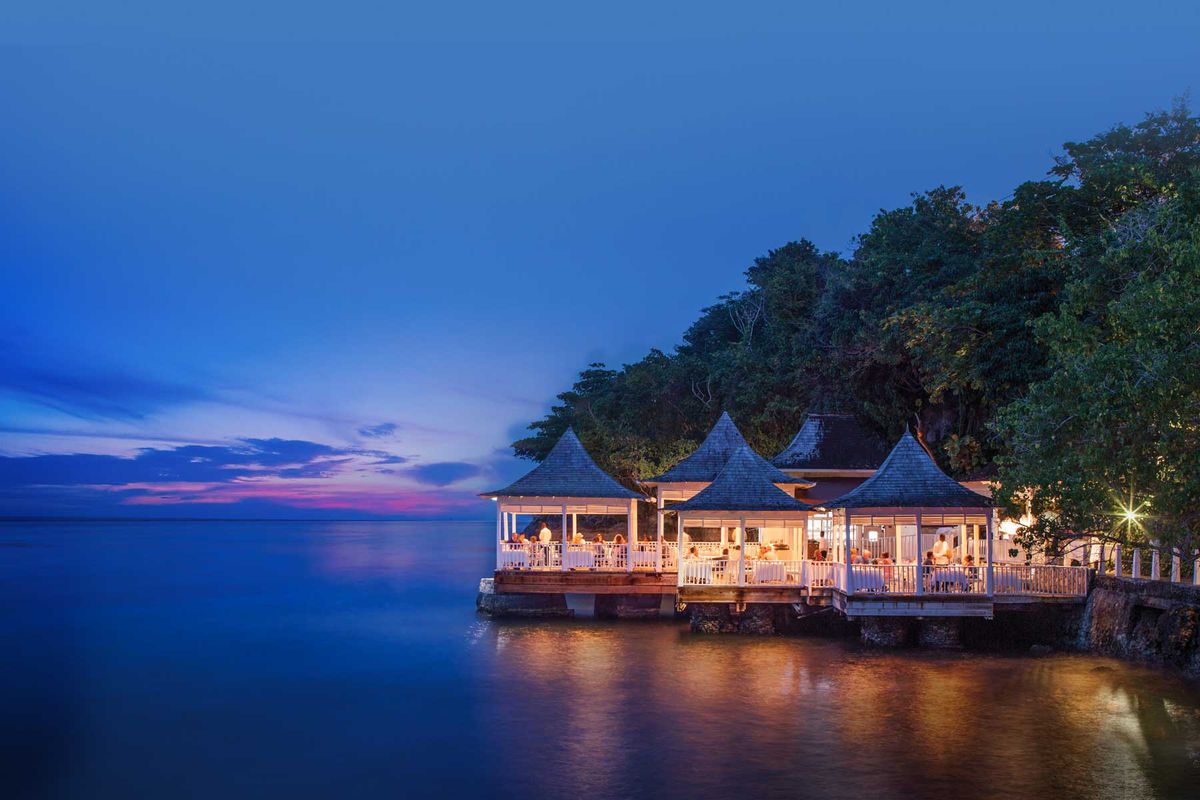 Overwater dining at the Couples Tower Isle resort