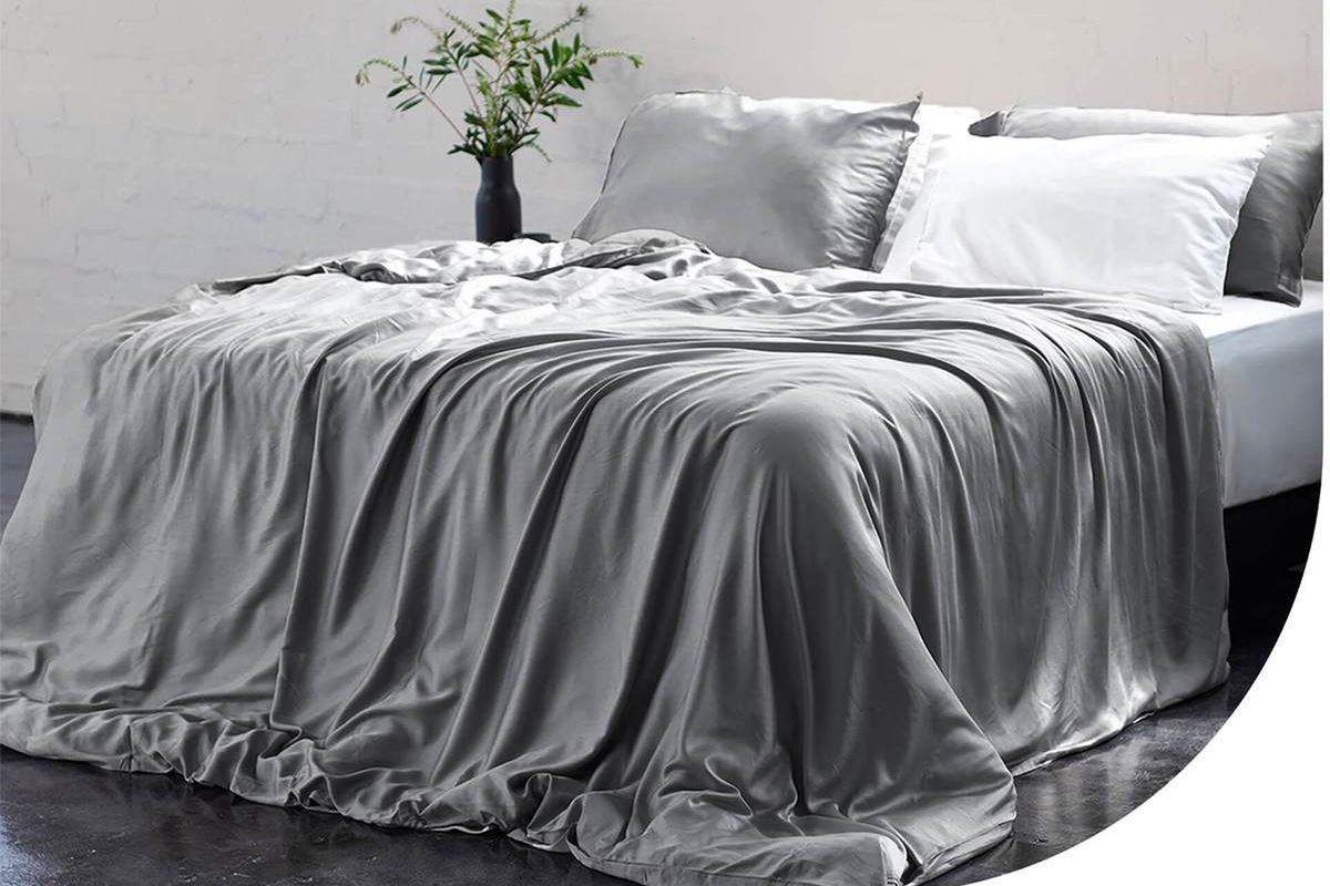 Grey bedding on bed