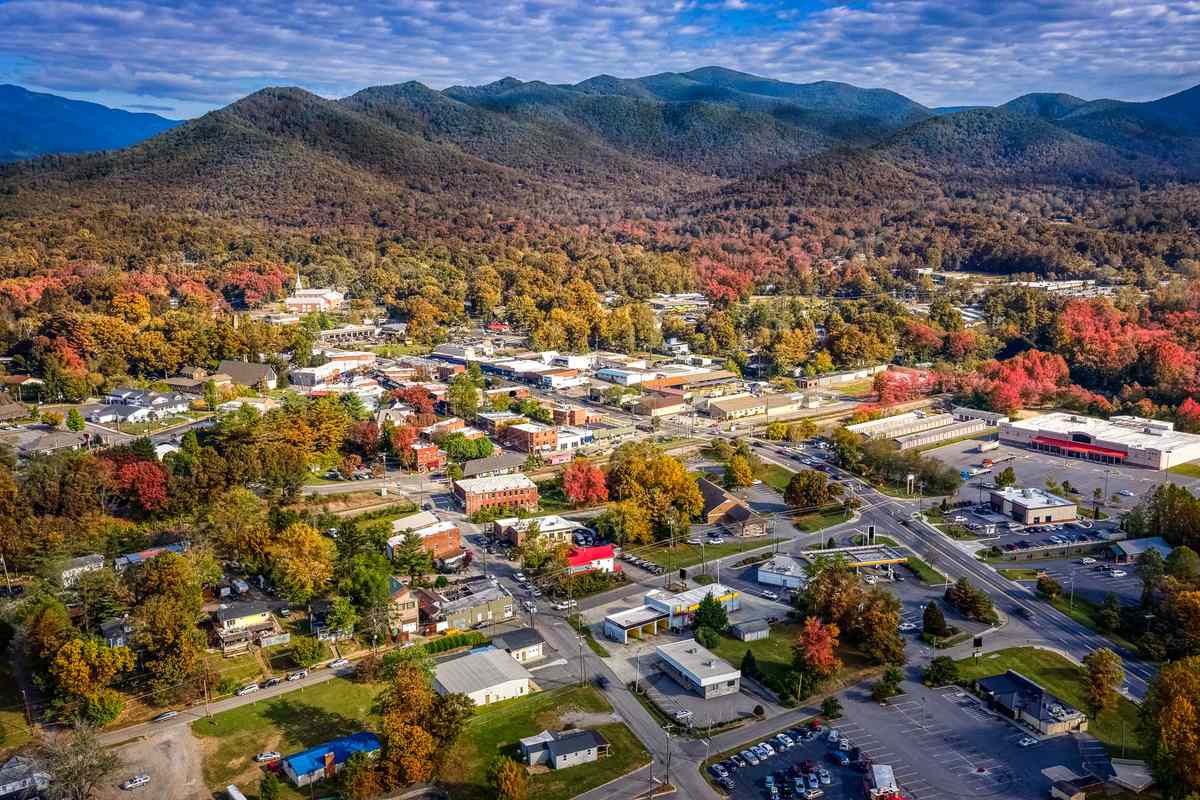 Aerial view picturesque Asheville neighborhood during the Fall with colors starting to show