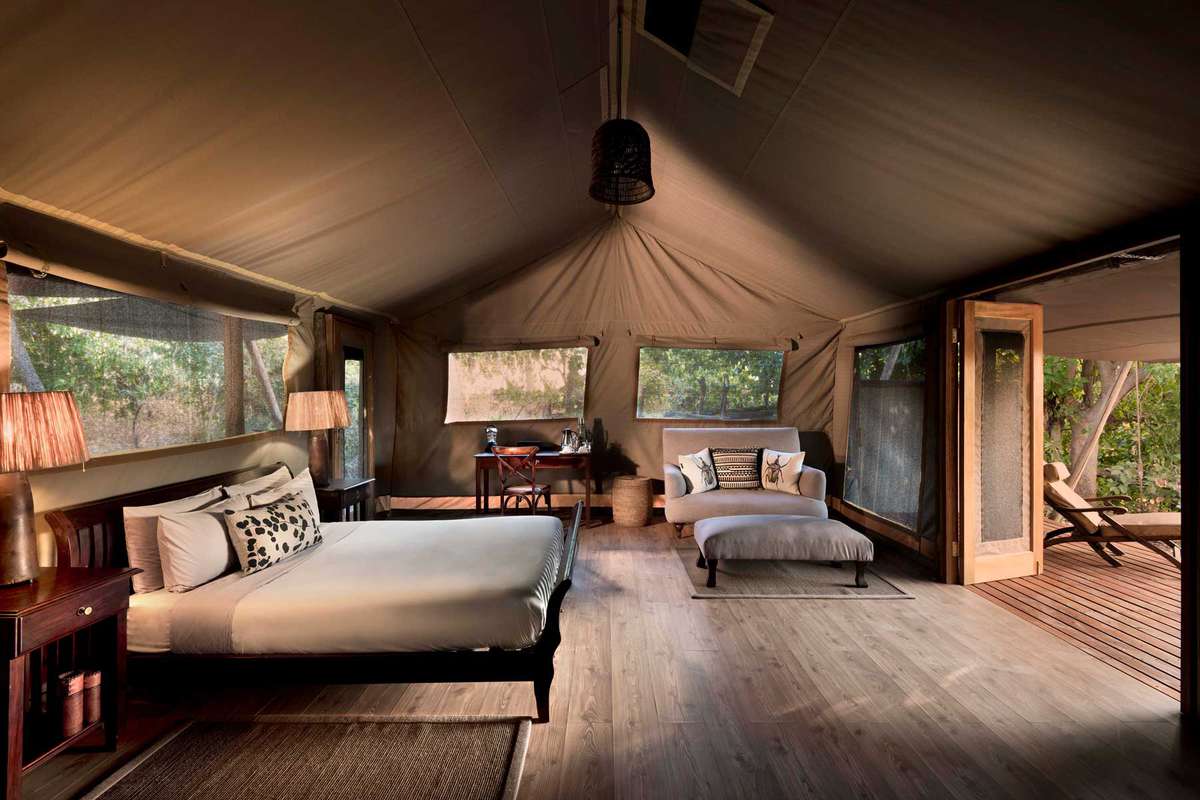 Inside luxury safari camp bedroom in Botswana