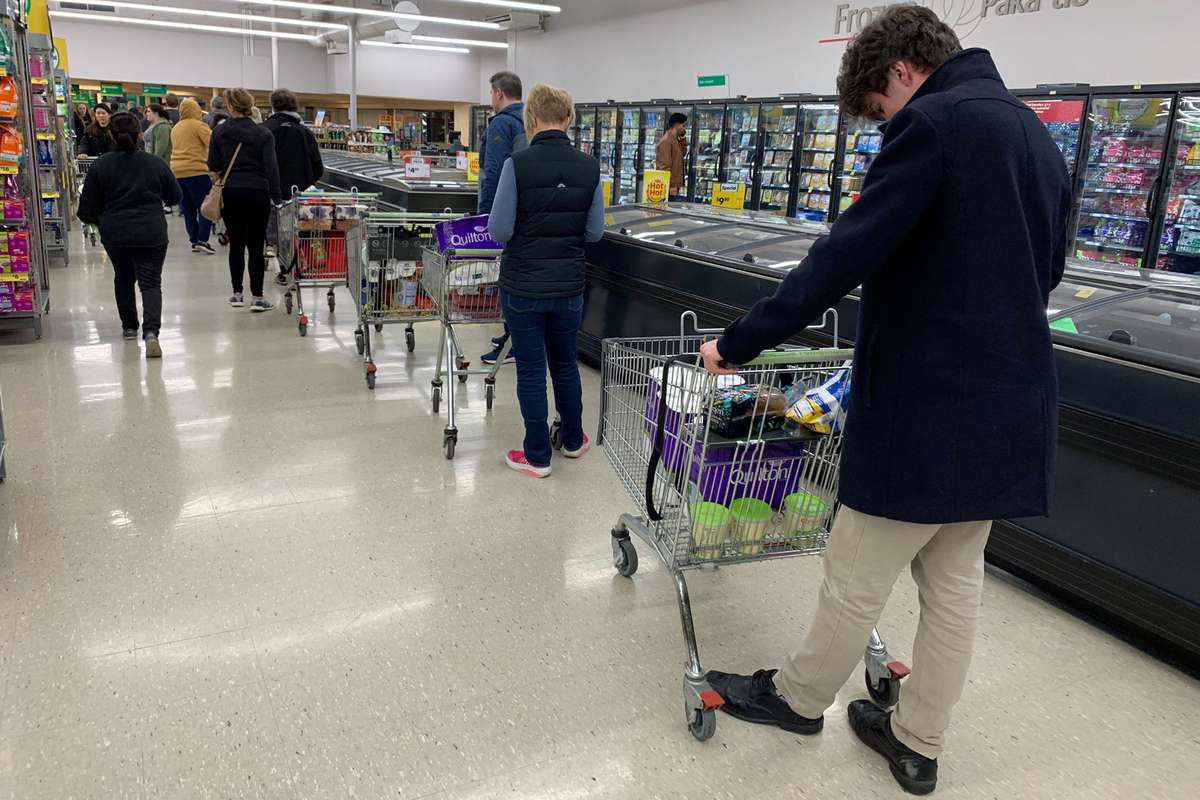 supermarket guest standing in a line