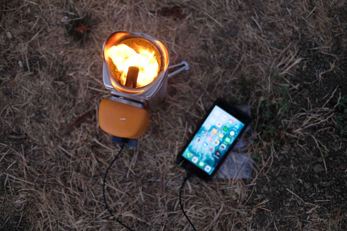A camp stove operated by cellphone battery power