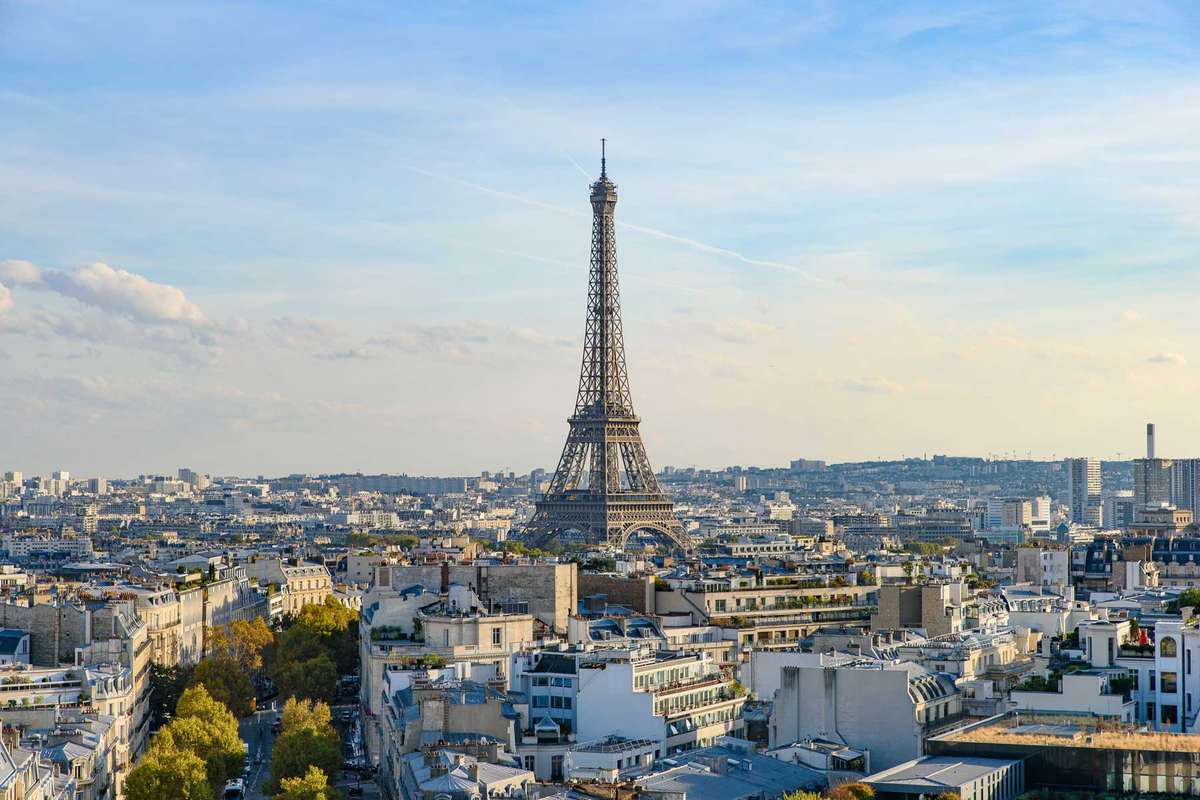 View of Eiffel Tower from Arc de Triomphe in Paris, France on a clear sunny day