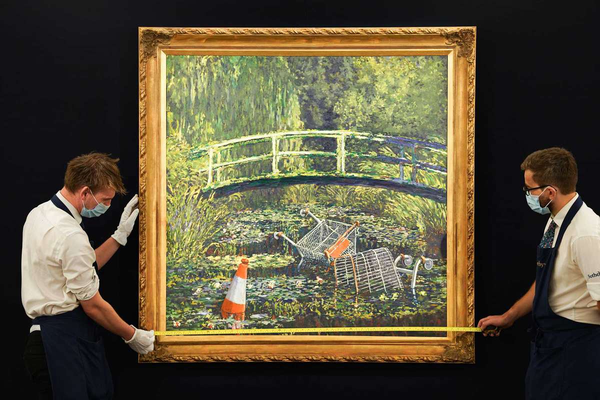 Banksy's 'Show Me The Monet' (2005) painting being moved at the Sotheby's auction