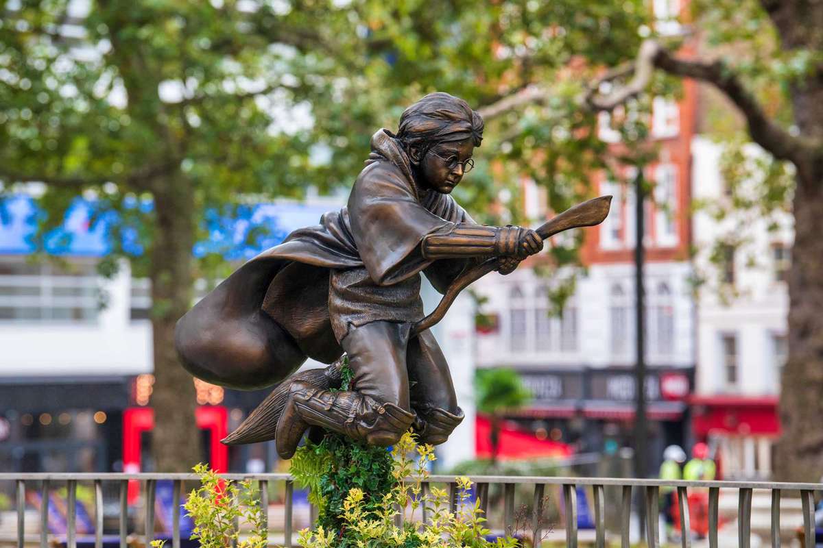 A new statue of Harry Potter in Leicester Square, London which has joined the eight other movie statues already on display.