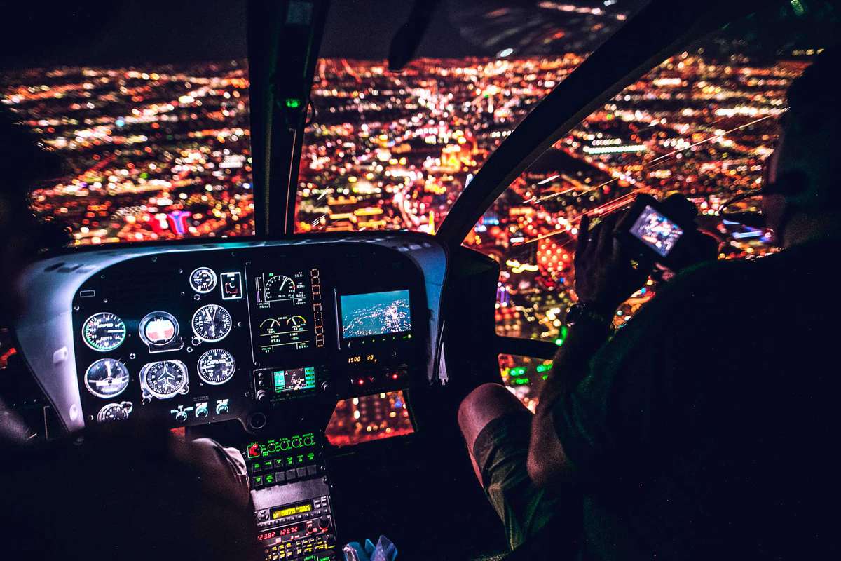 Interior of helicopter overlooking Las Vegas at night