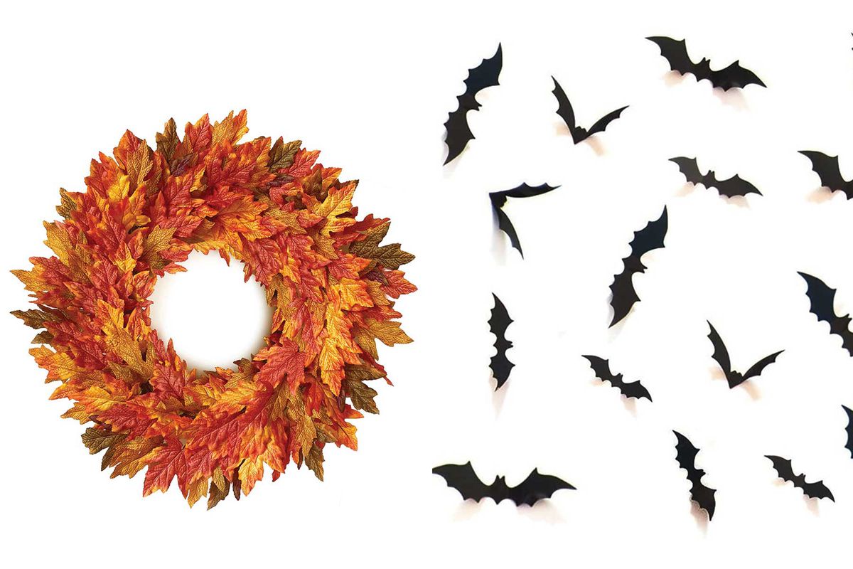 A fall leaves wreath and decorative bats for Halloween