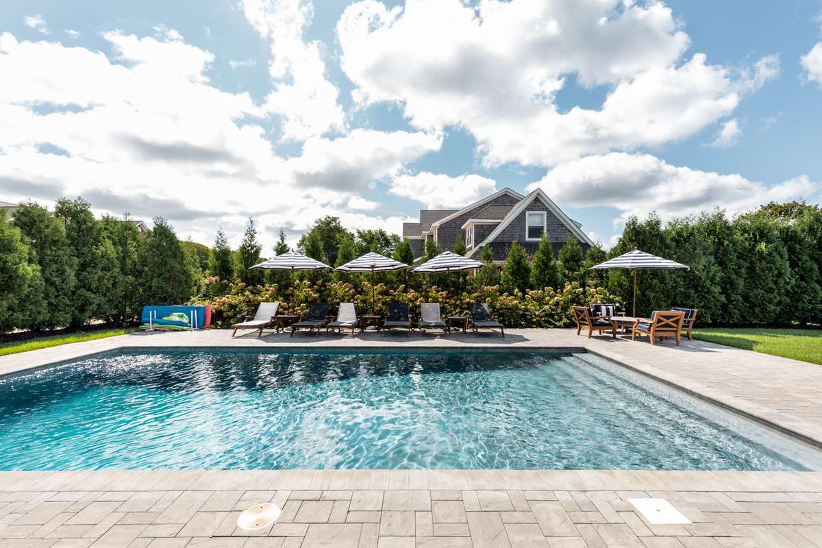 Luxury Airbnb Rental in South Hampton, New York shows pool