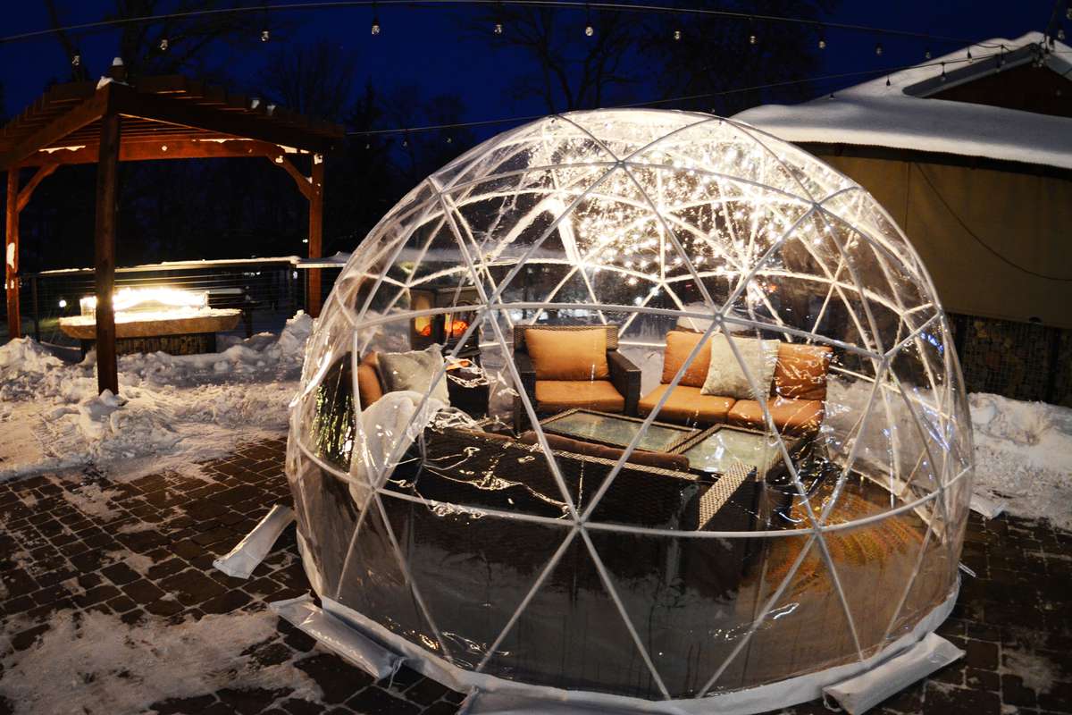 Outdoor igloo dome for dining and drinks at Grand View Lodge
