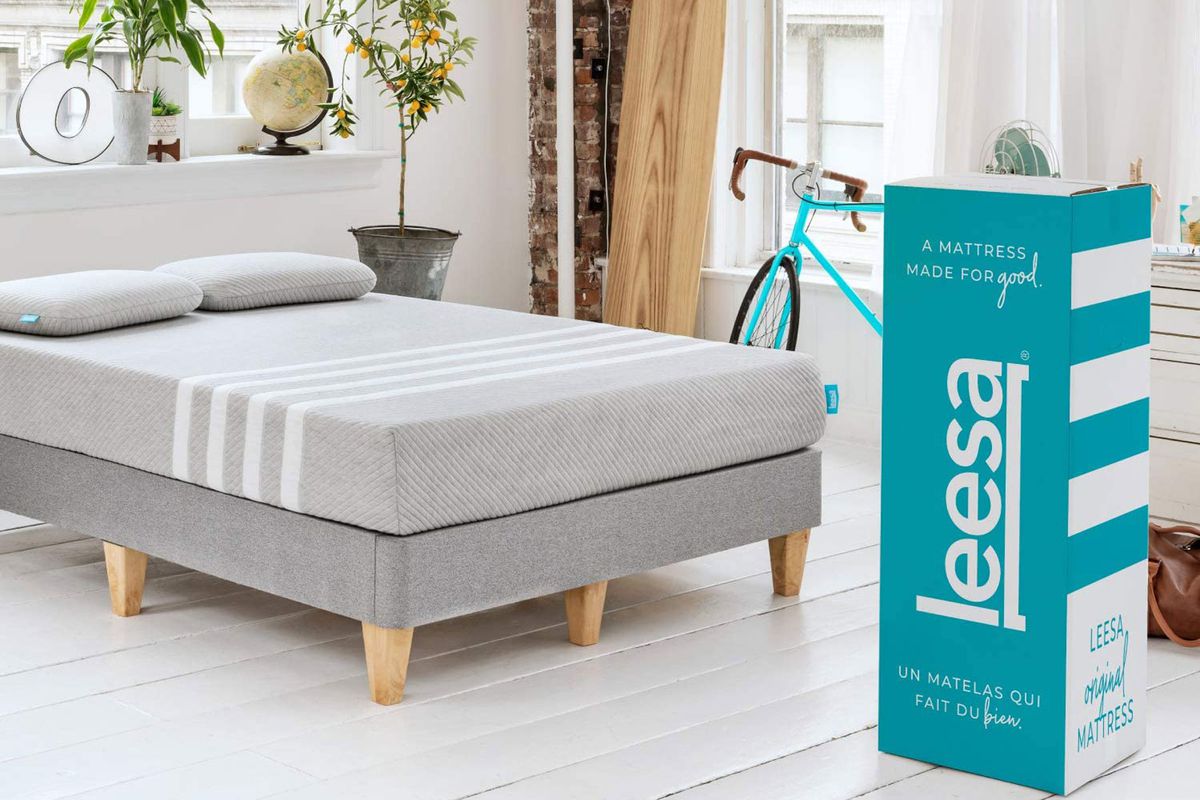Grey and white striped mattress and mattress box