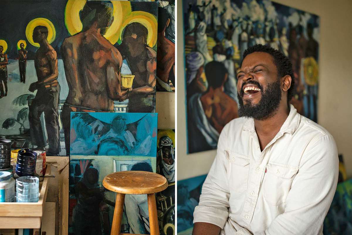 Painter Navarro Newton shown with examples of his painting work, photographed in his home studio