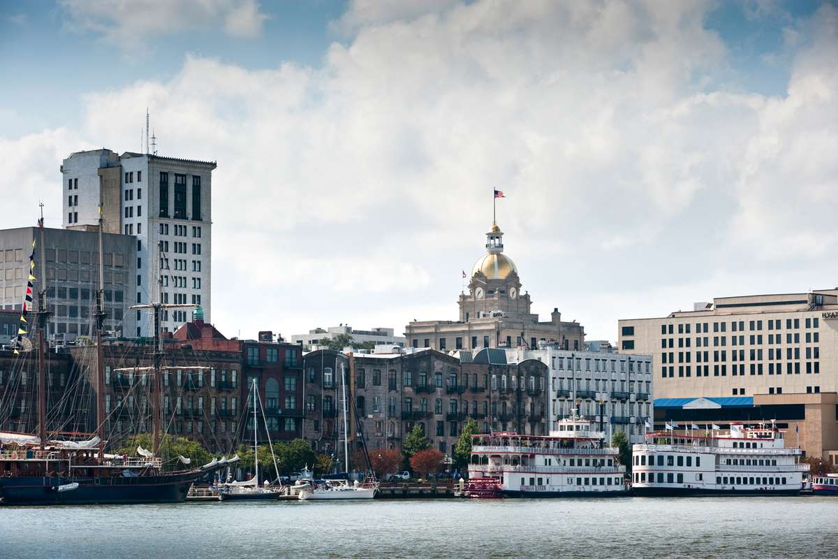 Riverside view of Savannah buildings and river boats