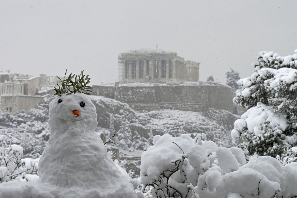 snowman in front of the Acropolis