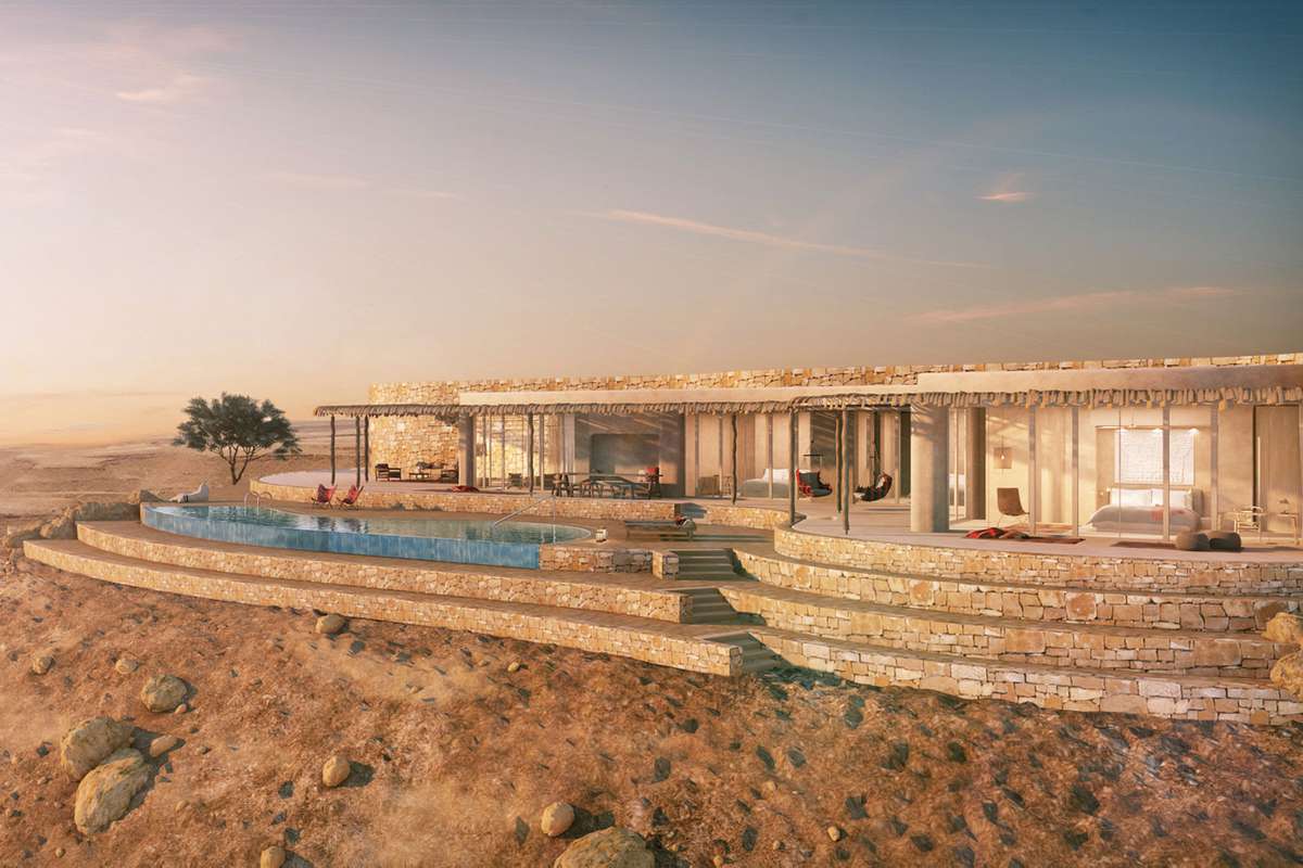 Six Senses Shaharut building with infinity pool and outdoor chairs in desert