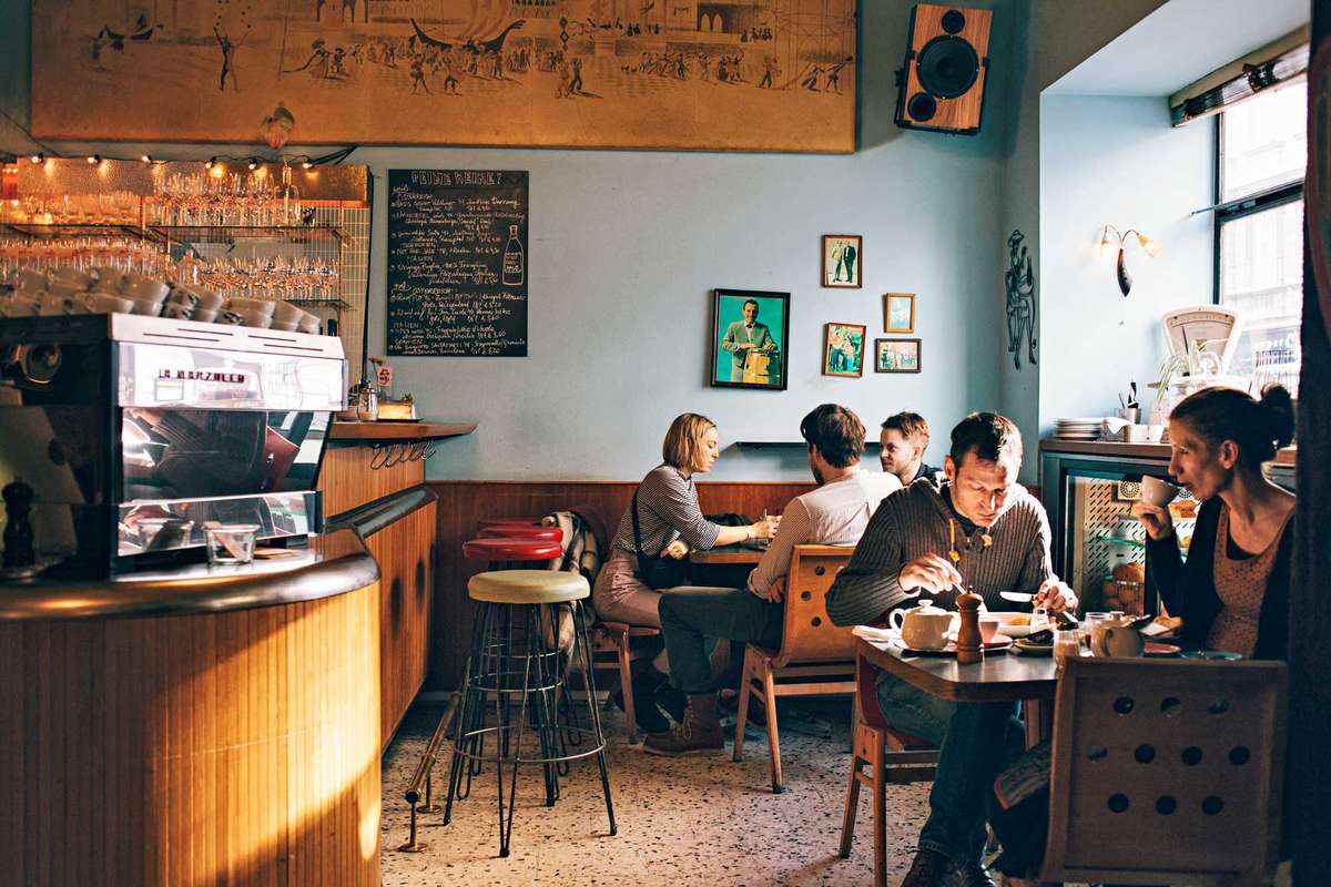 People drinking coffee in a Viennese cafe